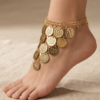 gold oriental anklet with coin charms and colorful beads worn on foot خلخال ذهبي شرقي مزين بعملات معدنية وخرز ملون على القدم Bracelet de cheville oriental dore avec pièces métalliques et perles colorées porté au pied